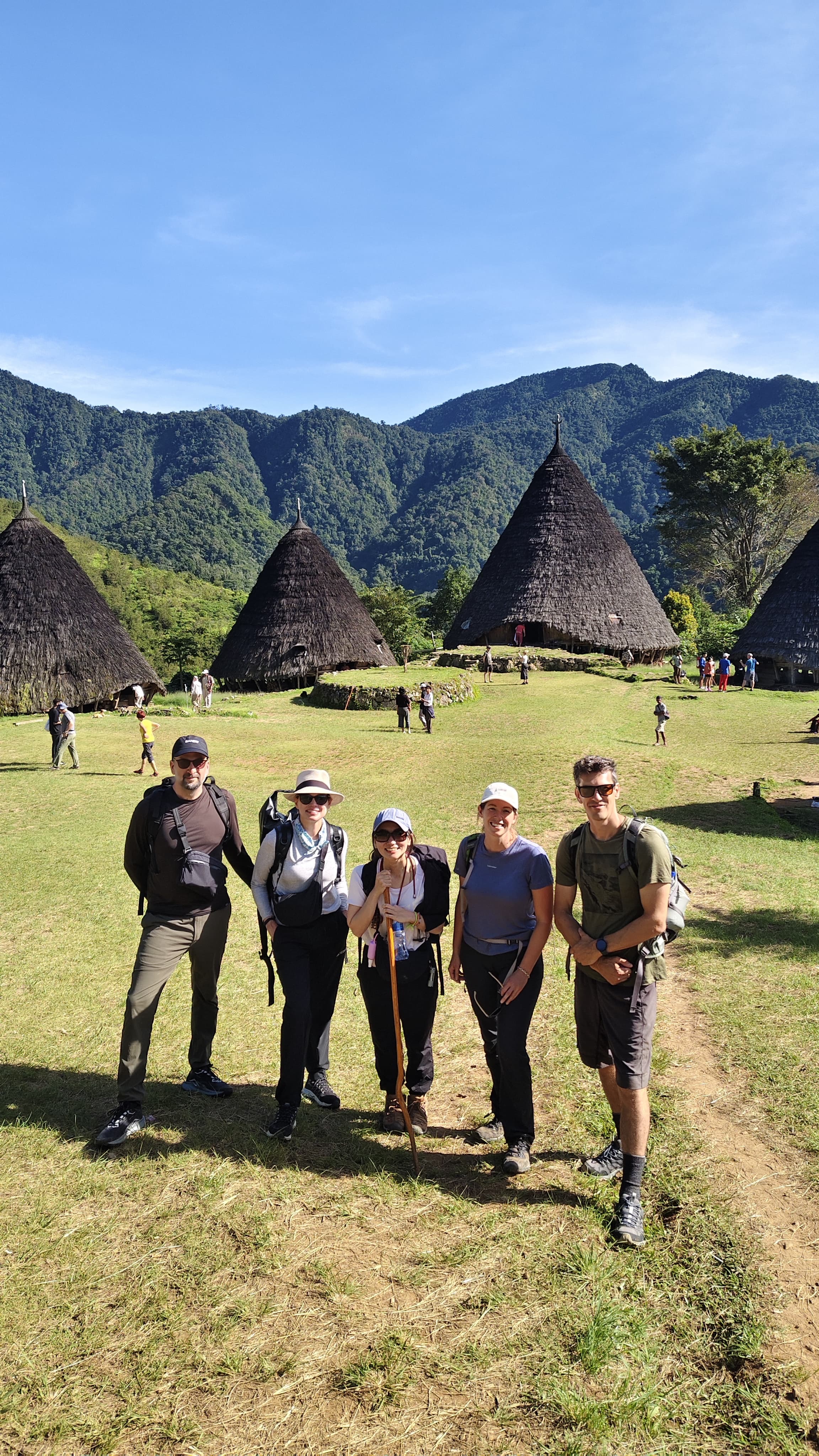 Full panorama of Waerebo village with all seven Mbaru Niang cone houses